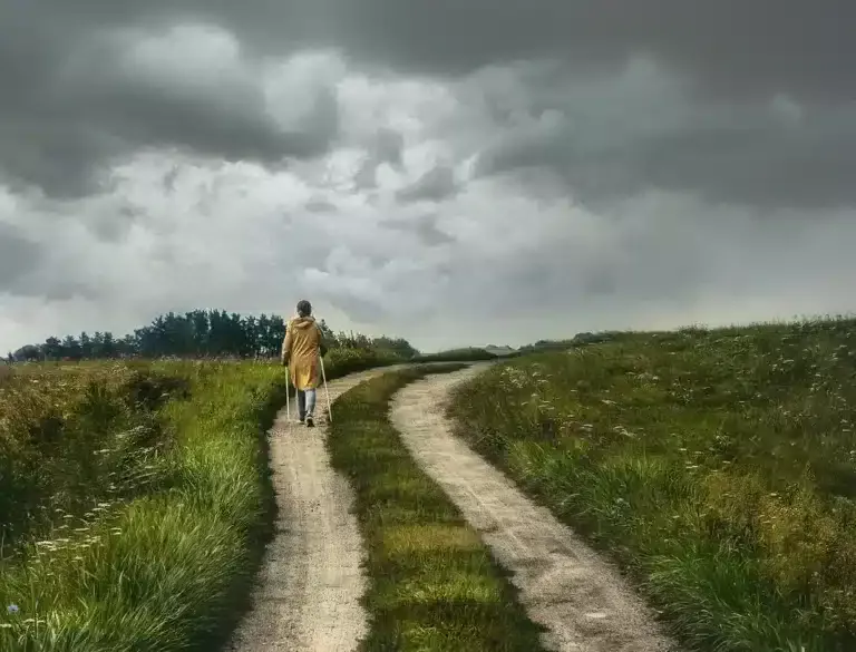 Teen walking on path into the unknown